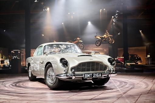 The photo shows one of the famous James Bond cars, a silver Aston Martin