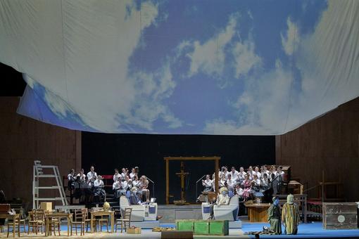 Scene photo from the opera Il ritorno d' Ulisse in patria, the scene is designed like a game or talk show with presenter or contestant and audience in the background